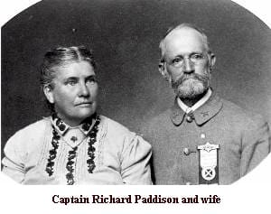 A man and woman in native american garb.