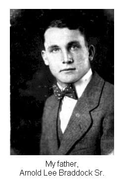 A man in a suit and bow tie.