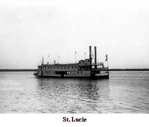 A large boat floating on top of water.