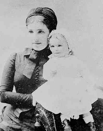 A woman and child pose for the camera.